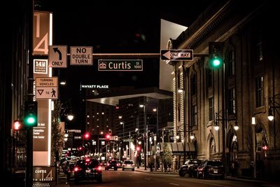 Low angle view of illuminated city at night