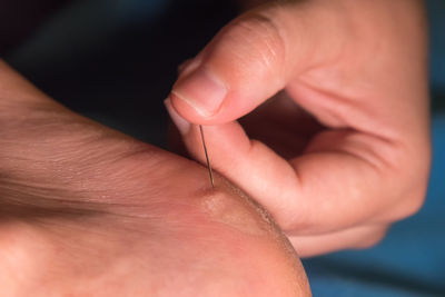 Close-up of woman holding hands