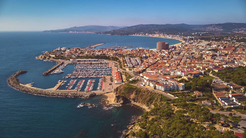 High angle view of city by sea