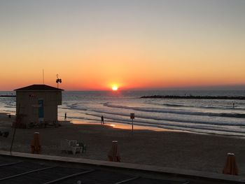 View of beach at sunset