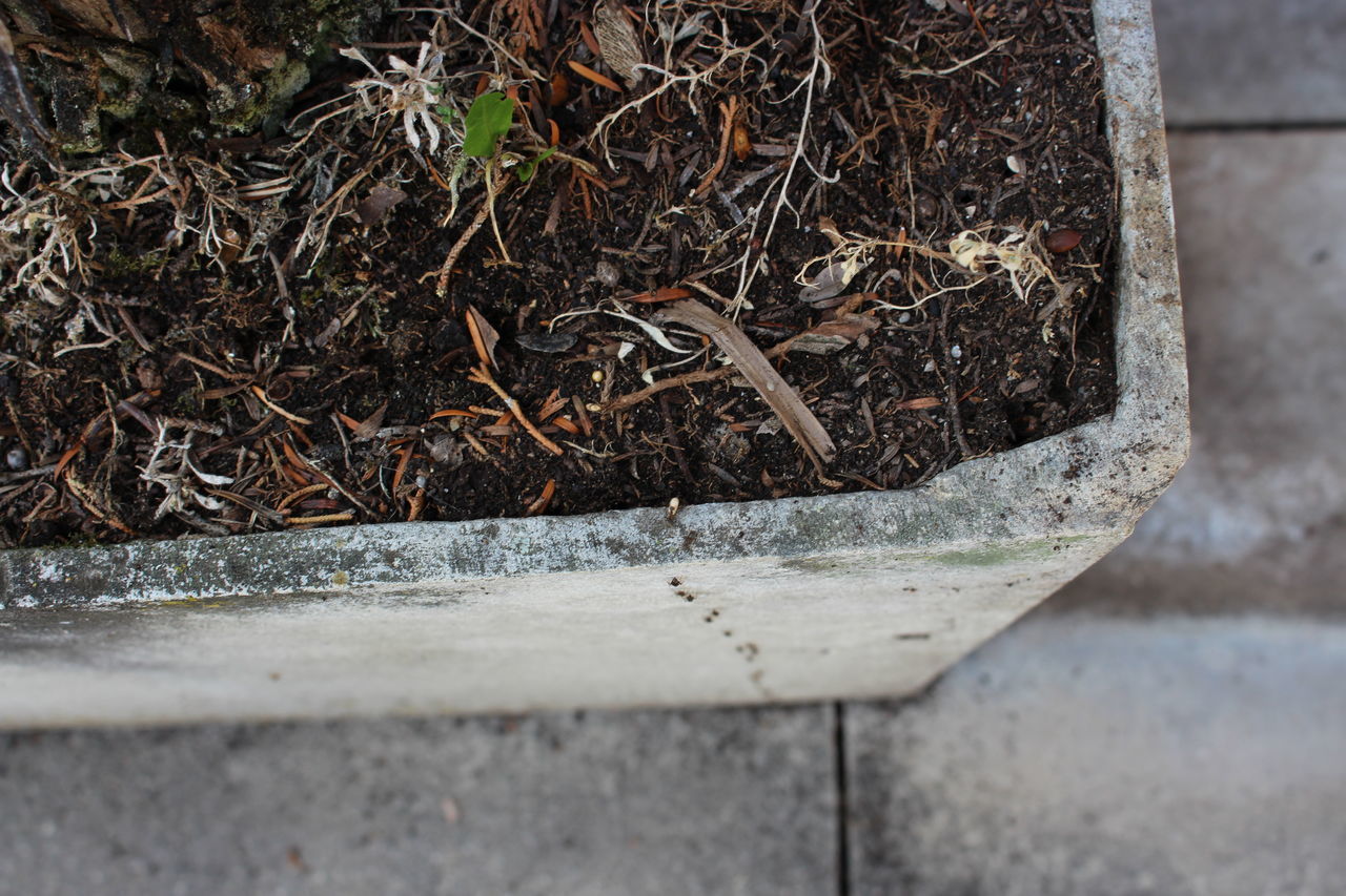 HIGH ANGLE VIEW OF DAMAGED METAL STRUCTURE