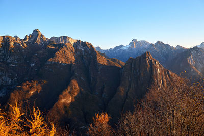 View of mountain range against clear sky