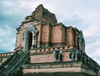 Low angle view of old building against sky