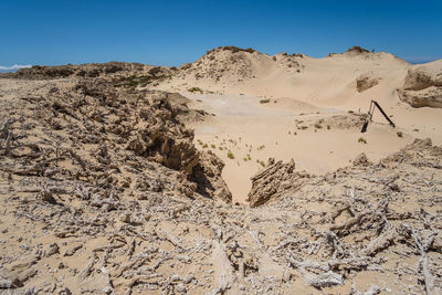 Scenic view of desert against clear sky