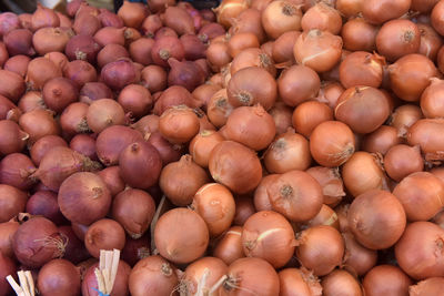 Full frame shot of onions for sale at market stall