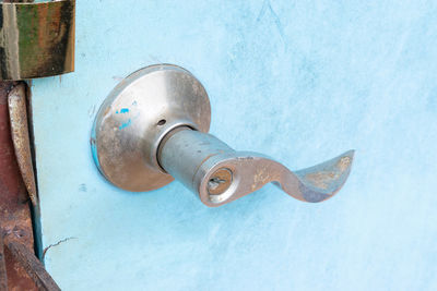 Close-up of rusty pipe on wall