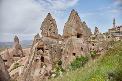 Panoramic view of rock formations against sky