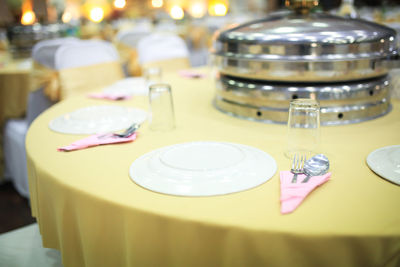 Close-up of wineglasses on table
