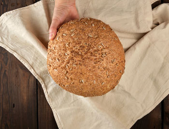 Close-up of hand holding bread