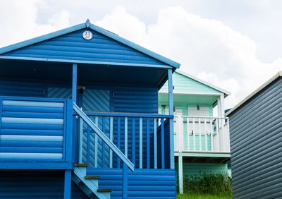 Low angle view of house on building against sky