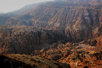 Aerial view of landscape with mountain range in background