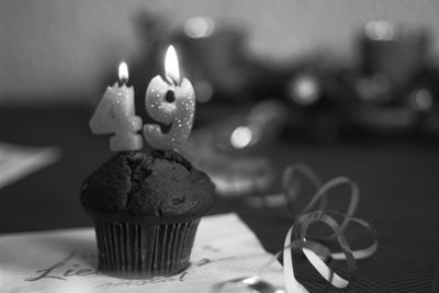 Close-up of candles on table