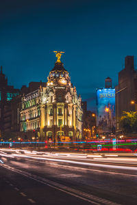 Light trails on city street at night in madid , spain