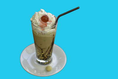 High angle view of ice cream against clear blue sky