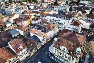 High angle view of street amidst buildings in city