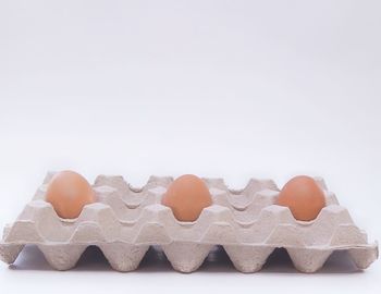 Close-up of cake against white background