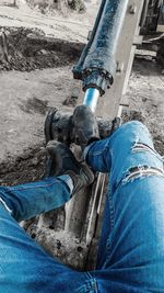 Low section of man working at construction site