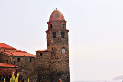 Clock tower against sky