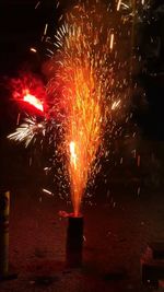 Firework display at night