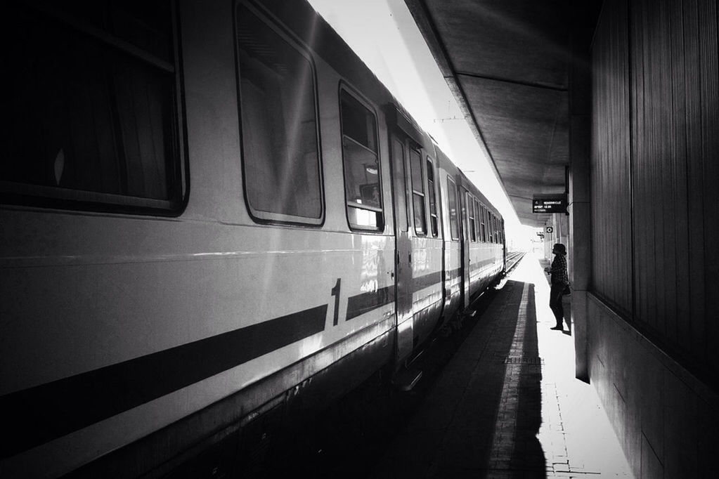 transportation, railroad station platform, public transportation, railroad station, indoors, rail transportation, railroad track, mode of transport, train - vehicle, the way forward, travel, built structure, passenger train, diminishing perspective, architecture, on the move, train, public transport, incidental people