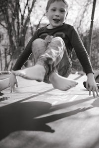 Full length of girl sitting on floor