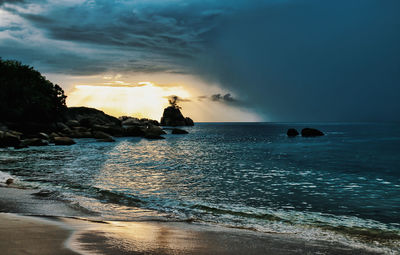 Scenic view of sea against sky during sunset