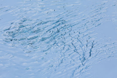 High angle view of snow on shore