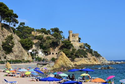 Scenic view of sea against clear blue sky