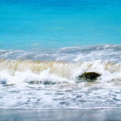 Sea waves splashing on shore