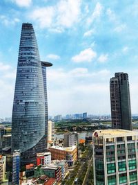 Modern buildings in city against sky