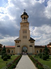 View of bell tower against cloudy sky