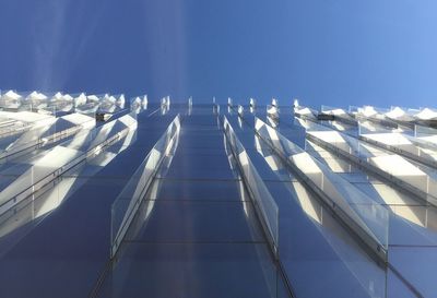 View of trees against blue sky