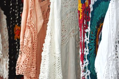 Full frame shot of multi colored umbrellas hanging at store