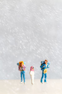 Close-up of figurines on snow