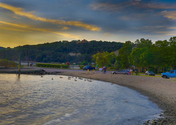 Scenic view of beach against sky during sunset