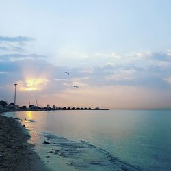 Scenic view of sea against sky during sunset