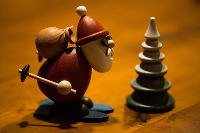 Close-up of wooden figurine on table