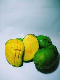 Close-up of fruits against white background