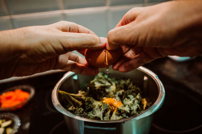 Cropped image of person having food