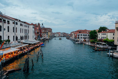 Canal passing through city buildings