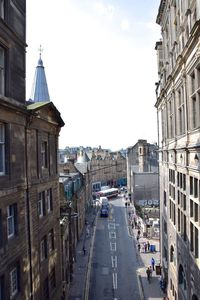 High angle view of street amidst buildings in city