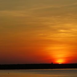 Scenic view of dramatic sky during sunset