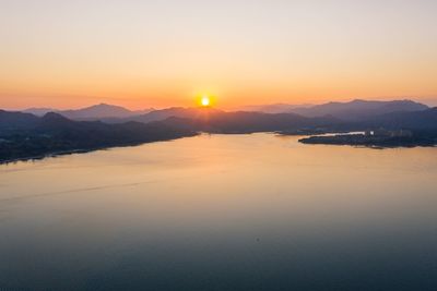 Scenic view of sea against sky during sunset