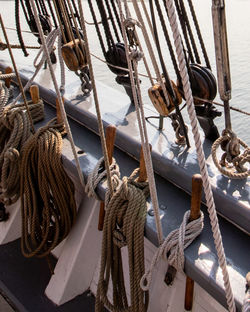 Sailboats moored in sea