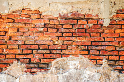 Full frame shot of weathered brick wall