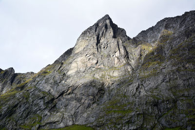 Low angle view of rock formations against sky