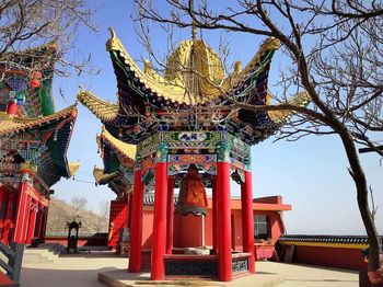 Exterior of temple against clear sky