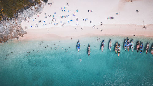 High angle view of people on sea shore