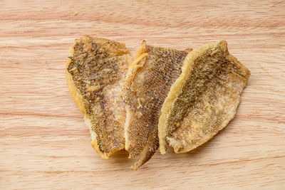 High angle view of bread on cutting board