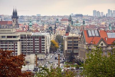 High angle view of buildings in city against sky